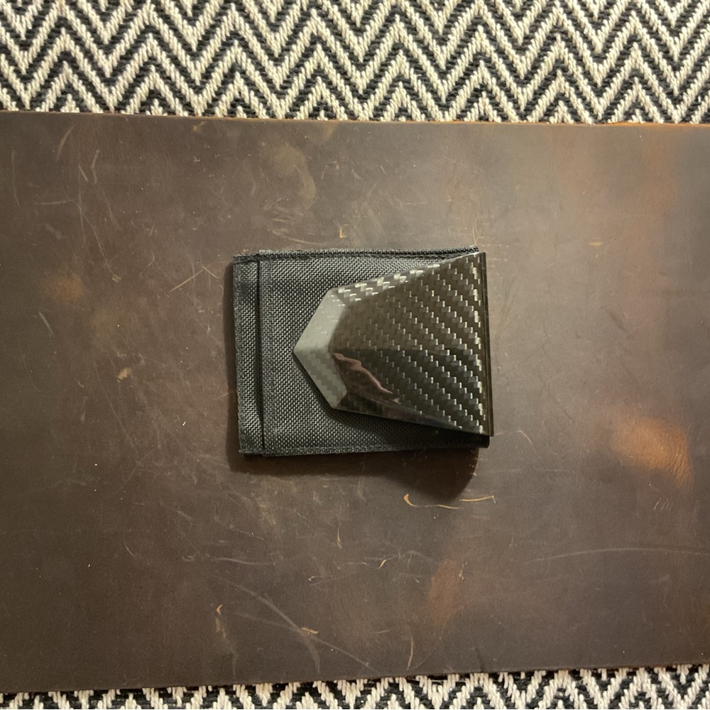 Carbon Fiber front pocket money clip with ballistic style fabric wallet.